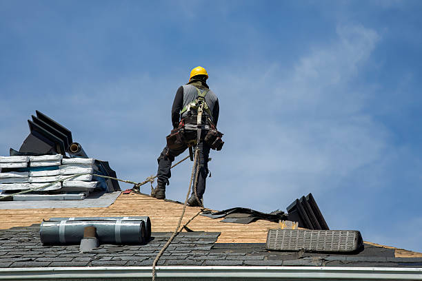 Professional Roofing technician working in Marchand, PA